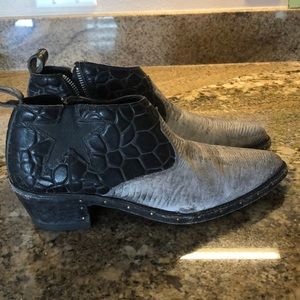 Free people distressed boots.